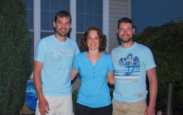 Dan with his twin sister and younger brother