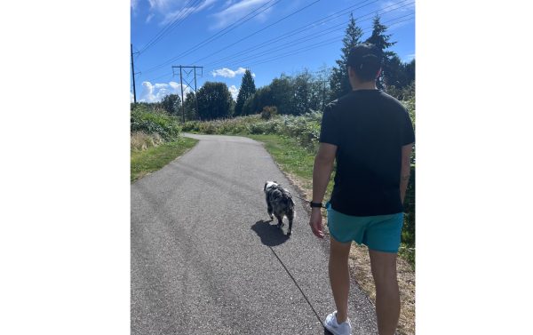 Walking on a nearby trail with Kristin's parents' aussie, Blu.