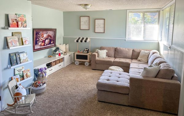 Family room where we like to play, build forts, read, or snuggle up on the couch watching movies together
